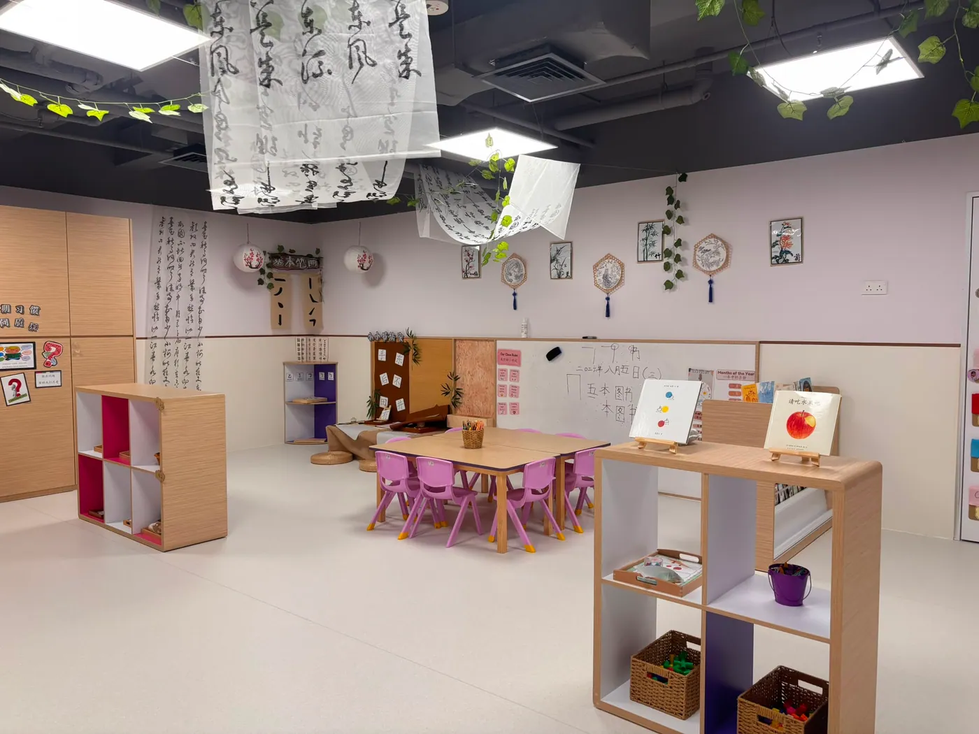 A Mandarin studio with calligraphy scrolls, lanterns and cultural art