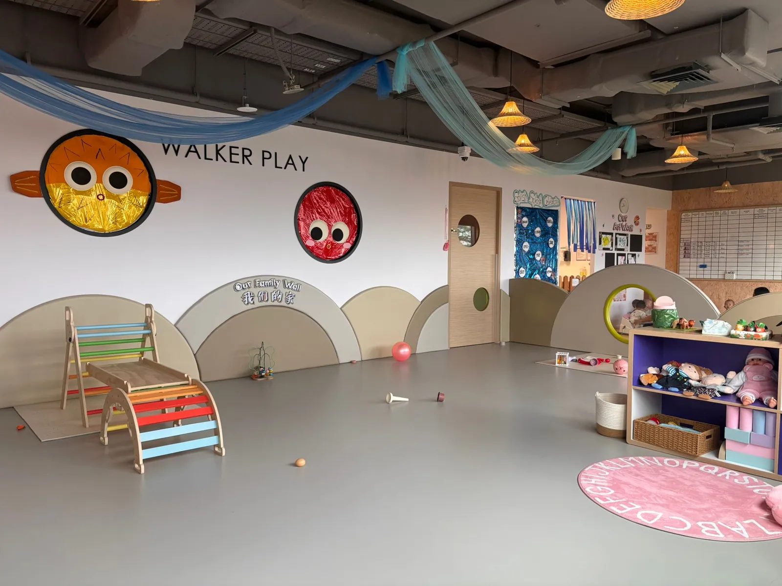 The Baby Play area with play gyms, star mats and the First Touch sensory panel